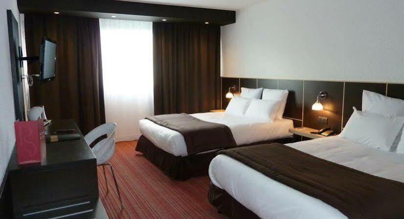 Zenitude Hotel Grenoble Alpexpo מראה חיצוני תמונה